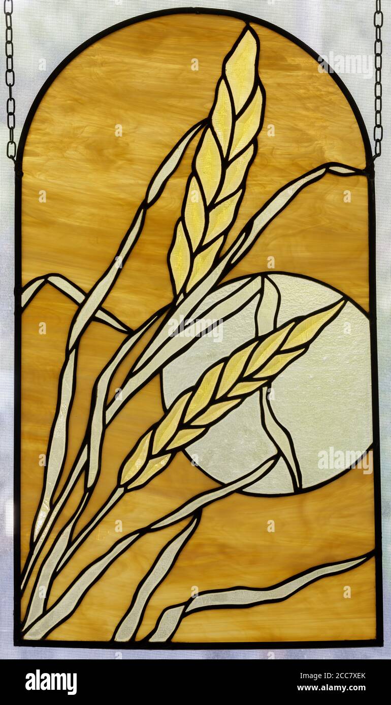 Stained Glass Window Panel of Harvest Moon. Stock Photo