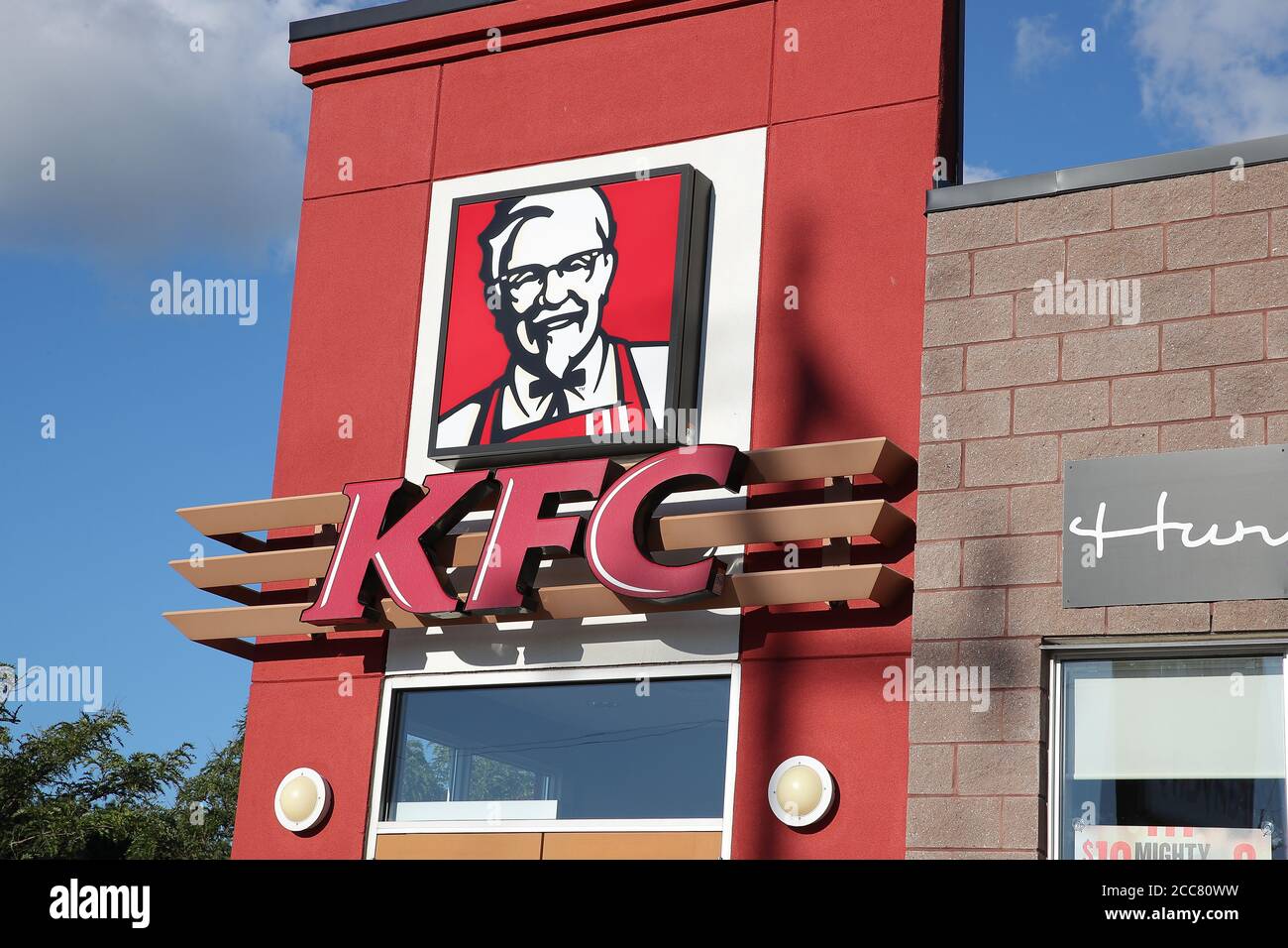 Kfc kentucky fried chicken fast food restaurant front entrance sign hi