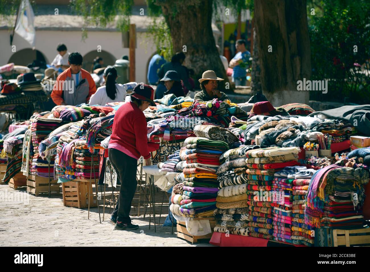Selling clothes and blankets at the outdoor market in the small Andean town  of San Francisco de Tilcara, Jujuy Province, northwest Argentina Stock  Photo - Alamy