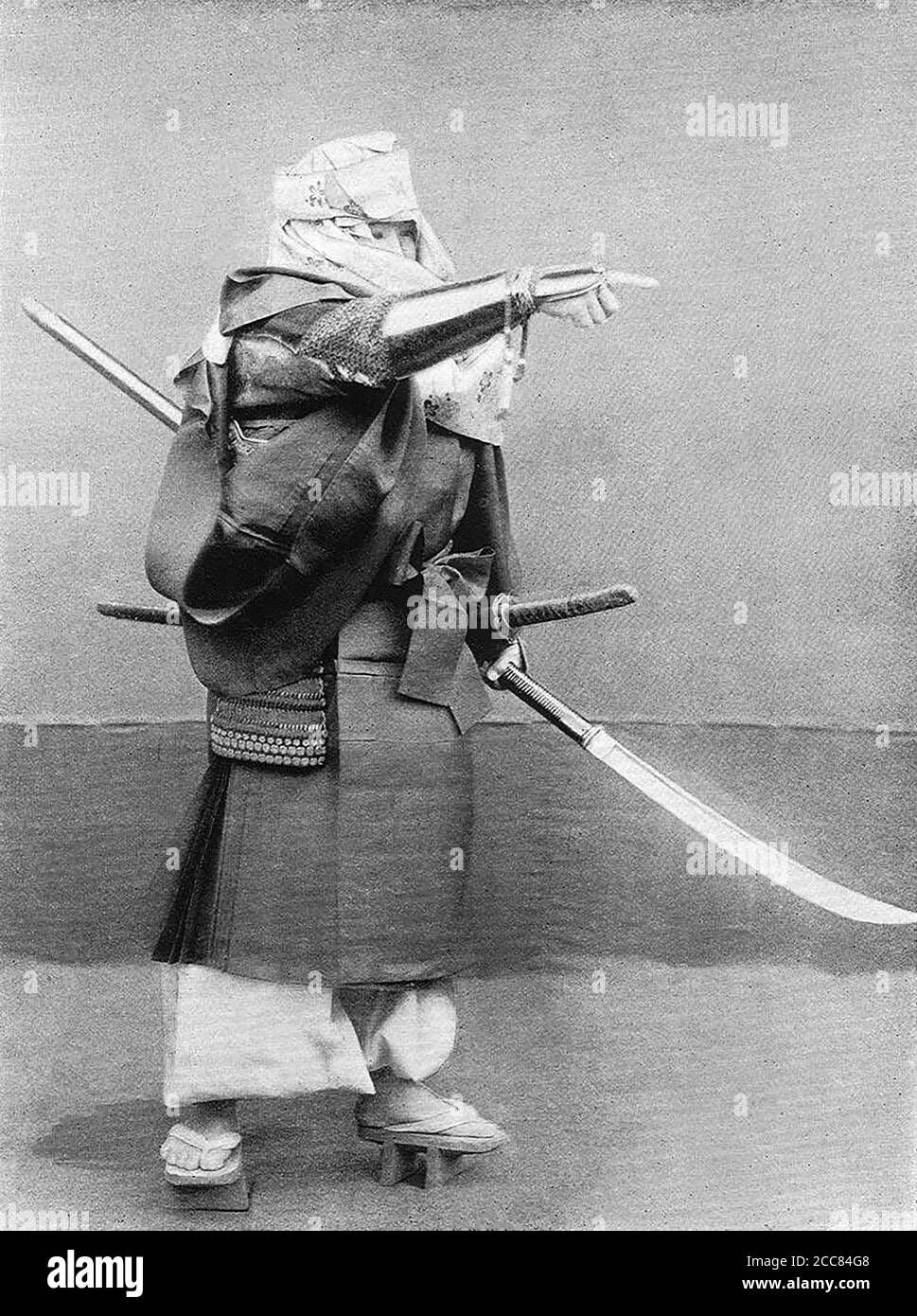 Japan: 'A Fighting Monk of the Kamakura Era'. Chemigraph from series 'Military Costumes in Old Japan' by Kazumasa Ogawa (1860-1929), 1893, Tokyo. Ogawa Kazumasa, also known as Ogawa Kazuma or Ogawa Isshin, was a Japanese photographer, chemigrapher, printer and publisher of the Meiji era. He was a pioneer in photomechanical printing and photography, and was born into the Matsudaira samurai clan, where he studied English and photography at the age of 15. Stock Photo