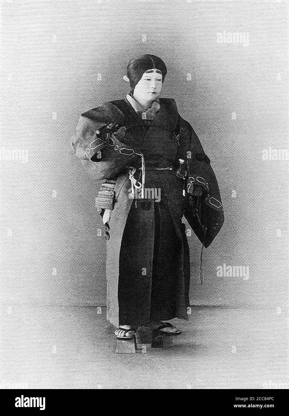 Japan: 'A Youthful Noble'. Chemigraph from series 'Military Costumes in Old Japan' by Kazumasa Ogawa (1860-1929), 1893, Tokyo. Ogawa Kazumasa, also known as Ogawa Kazuma or Ogawa Isshin, was a Japanese photographer, chemigrapher, printer and publisher of the Meiji era. He was a pioneer in photomechanical printing and photography, and was born into the Matsudaira samurai clan, where he studied English and photography at the age of 15. Stock Photo