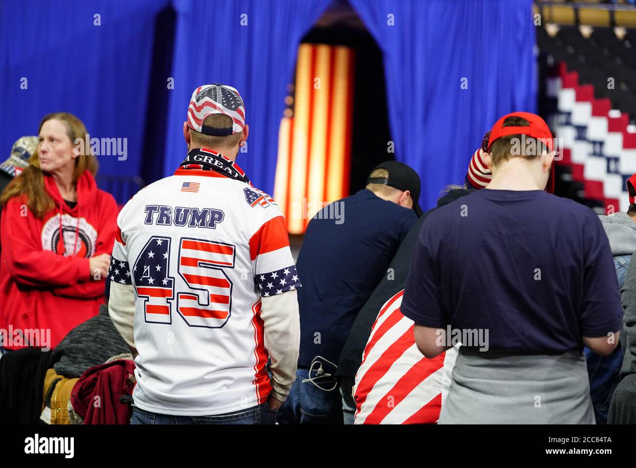 45th President Donald Trump supporters wear number 45 Jersey shirt to support the President of USA at UW- Milwaukee Panther Arena. MAGA Rally Stock Photo