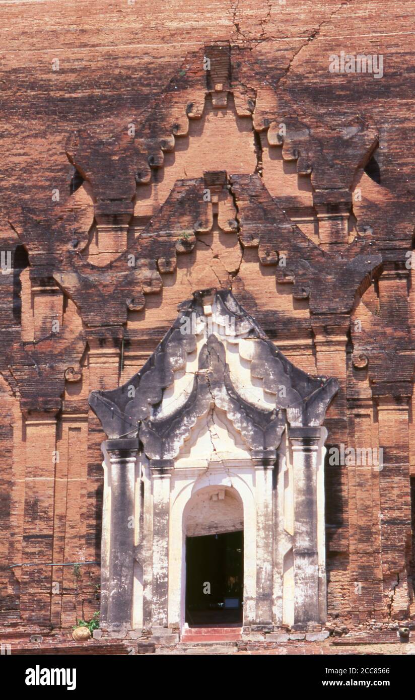 Burma / Myanmar: The massive bulk of the unfinished stupa of Mingun Pahtodawgyi (Mingun Temple), Sagaing District, near Mandalay. The Mingun Pahtodawgyi (Mingun Temple) was built in 1790 by King Bodawpaya (1745 - 1819) the sixth king of the Konbaung Dynasty. The enormous stupa was never completed and today stands at a height of 50m (164 ft). It was originally intended to be the tallest stupa in the world at a height of 150m (490 ft). Stock Photo