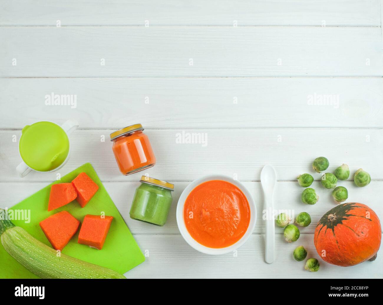 Fresh natural pumpkin and squash puree for baby Stock Photo