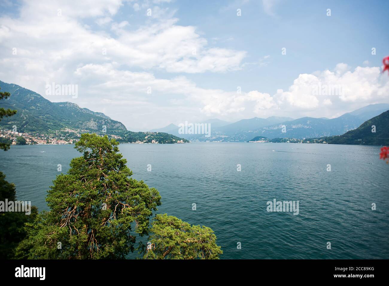 Panorama Lake Como in Italy. View in the Direction of the town Bellagio. Cloudy Sky. Stock Photo