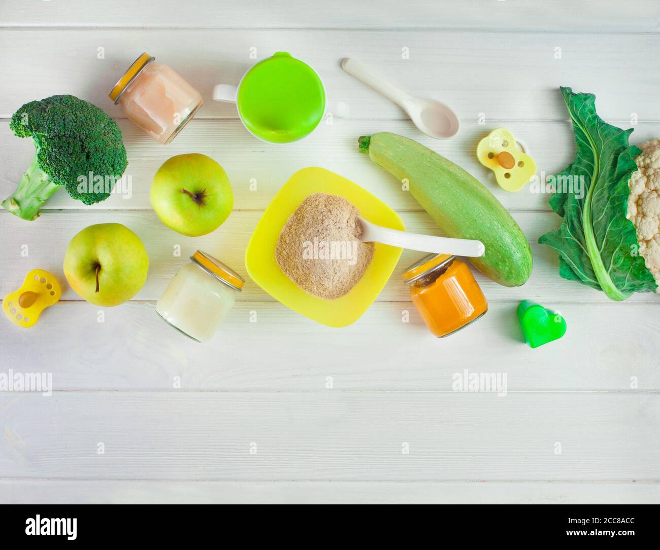 Natural vegetable and fruit puree and porridge for baby Stock Photo