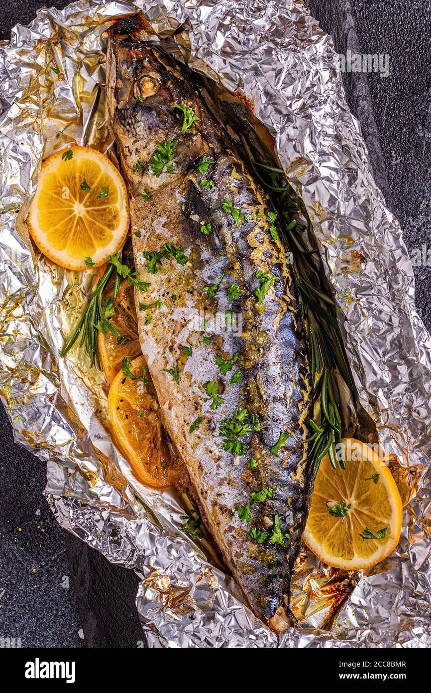 Mackerel baked in foil with spices, top view Stock Photo Alamy