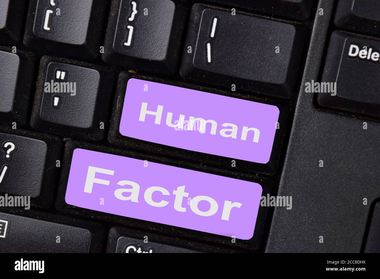 Human Factor write on keyboard isolated on laptop background Stock