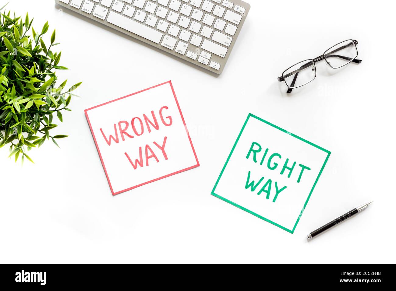 Problem solving. Right and wrong way icons on work desk from above ...