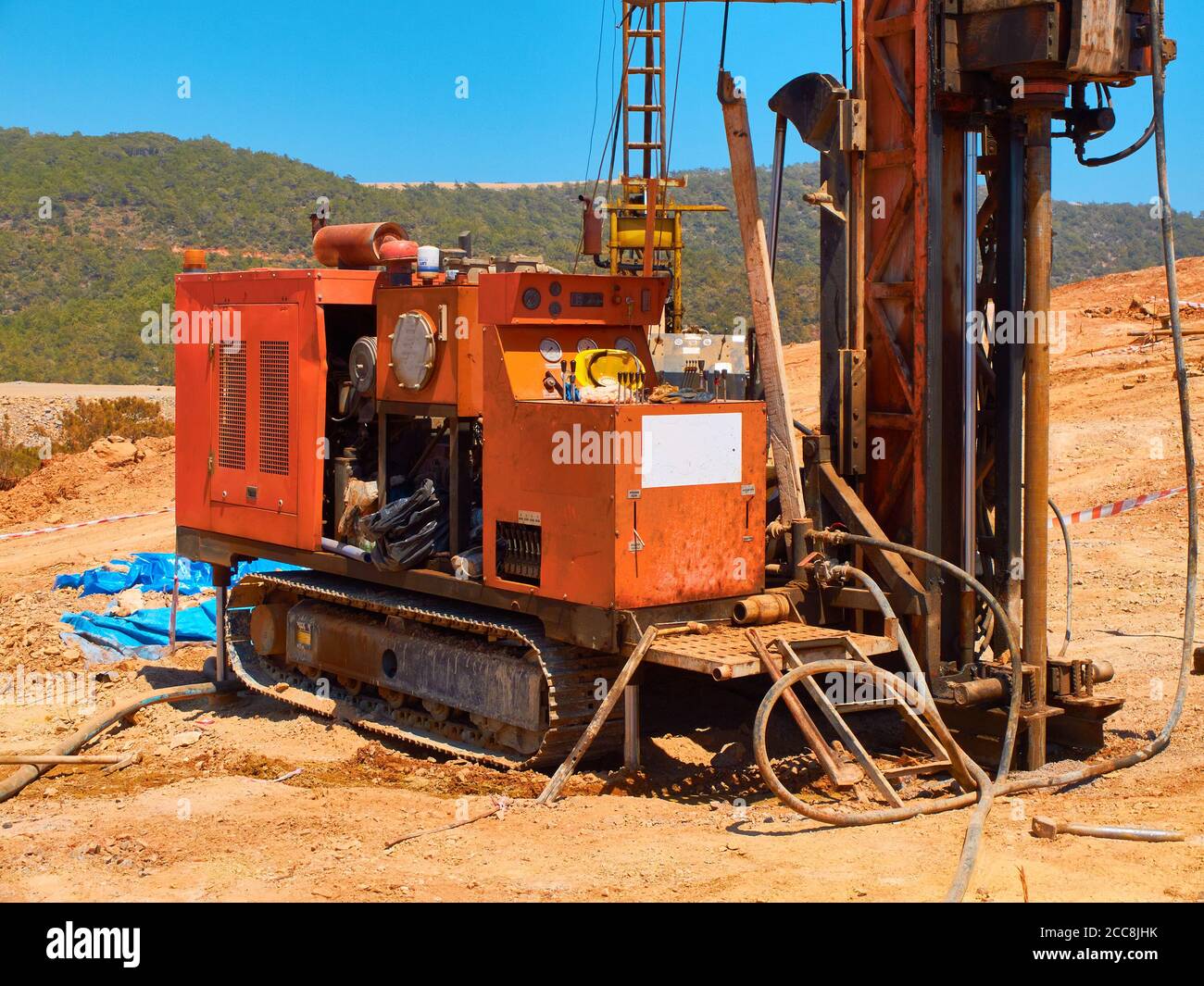 Crawler drilling rigs perform engineering and geological surveys. Stock Photo