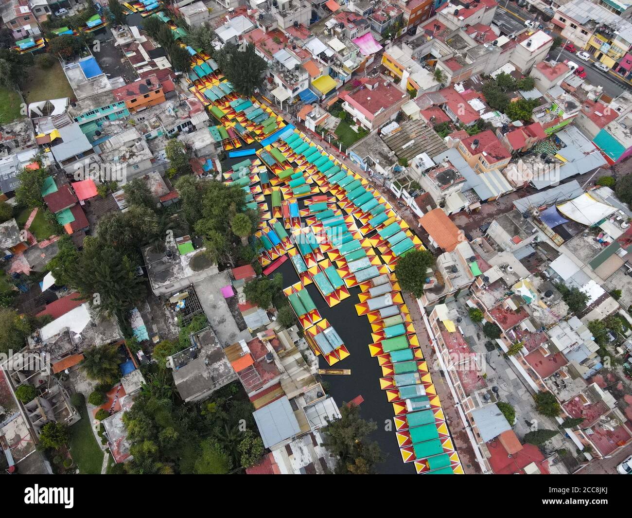 Mexico City, Mexico. 19th Aug, 2020. Photo taken with a drone shows  "Trajineras" parked in Xochimilco, a tourist site which will reopen to  public after months of closure, in Mexico City, Mexico,