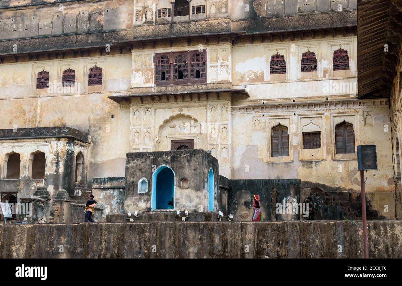Orchha, Madhya Pradesh/India - March 14 2019: View of the architectural details and the multi-storeyed windowed walls of Raja Mahal. Stock Photo