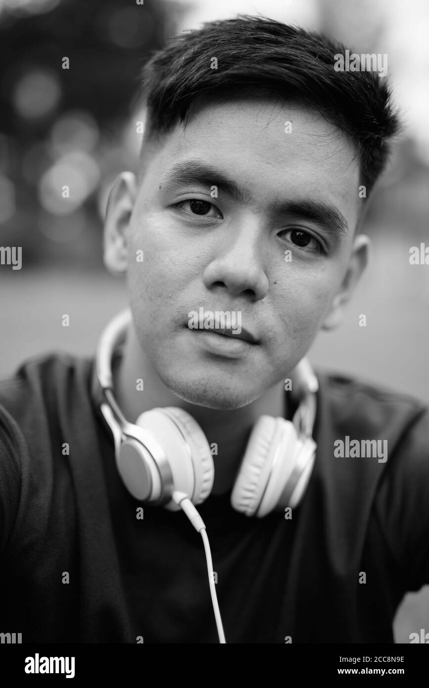Handsome asian guy Black and White Stock Photos & Images - Alamy