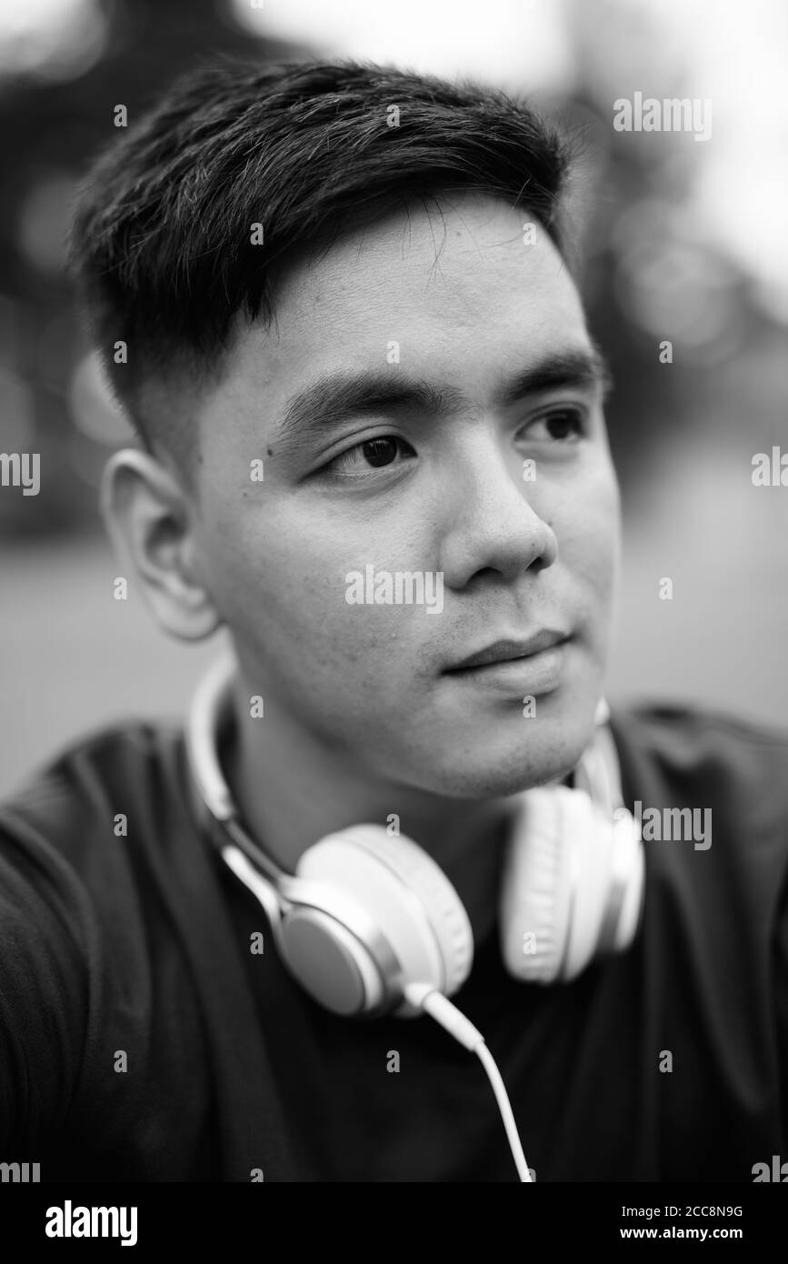 Asian young guy face closeup Black and White Stock Photos & Images - Alamy