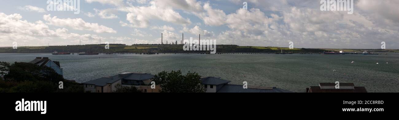 Pembroke oil refinery panorama from the mainland in wales on a sunny day in the summer Stock Photo