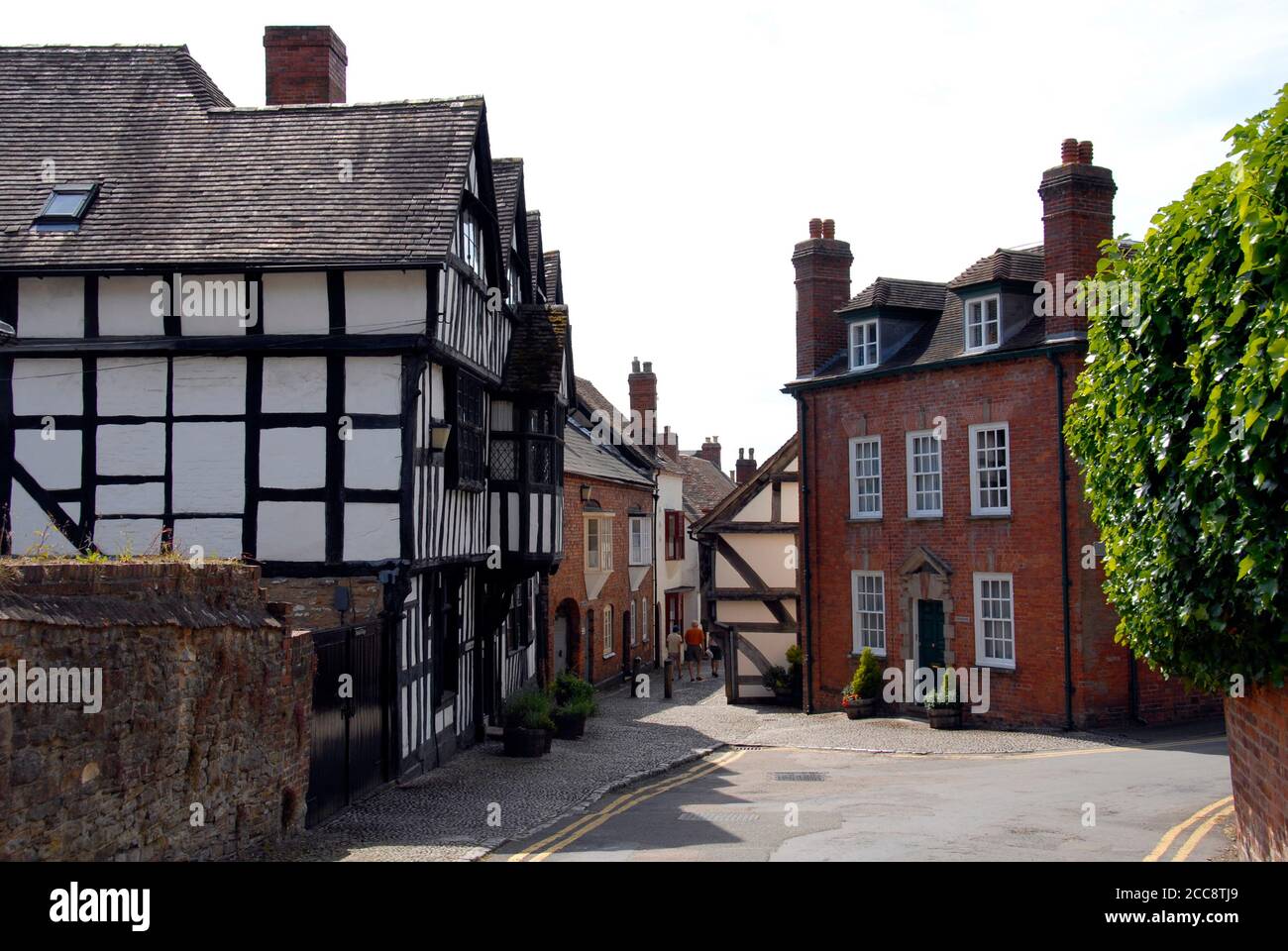 Church Lane, Ledbury, Herefordshire, England, with Church House, the half-timbered building, on the left hand side Stock Photo