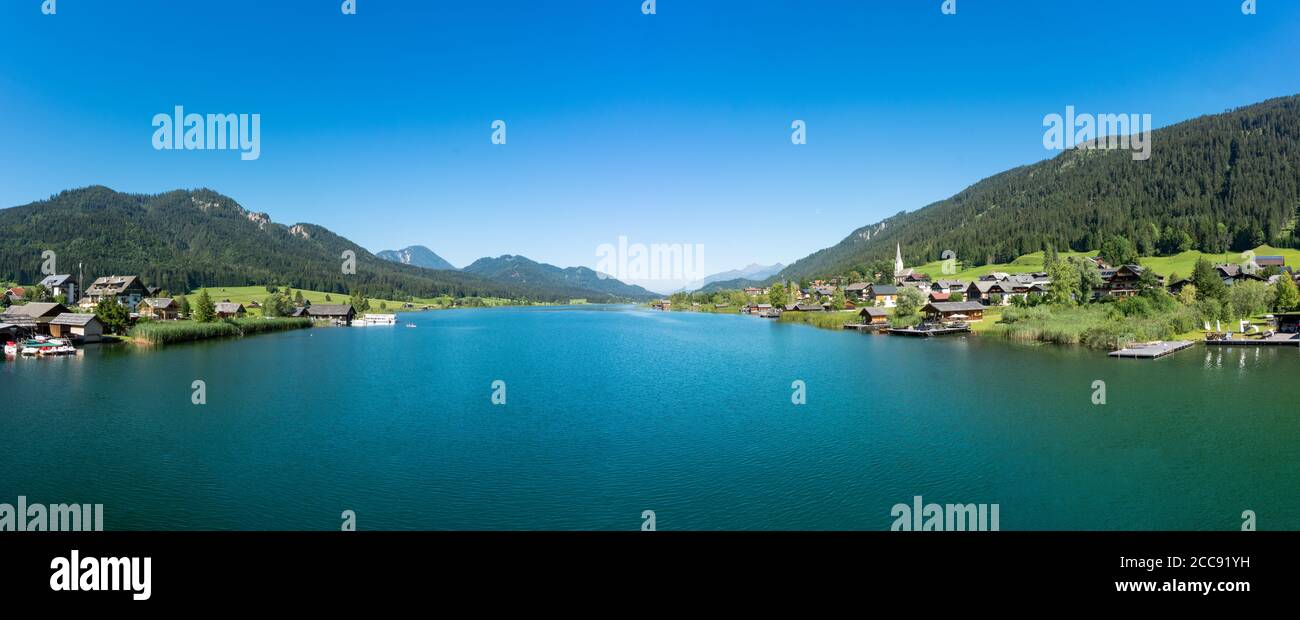 Weissensee and Techendorf in the Kärnten region. View to the famous lake in the South of Austria during summer. Stock Photo