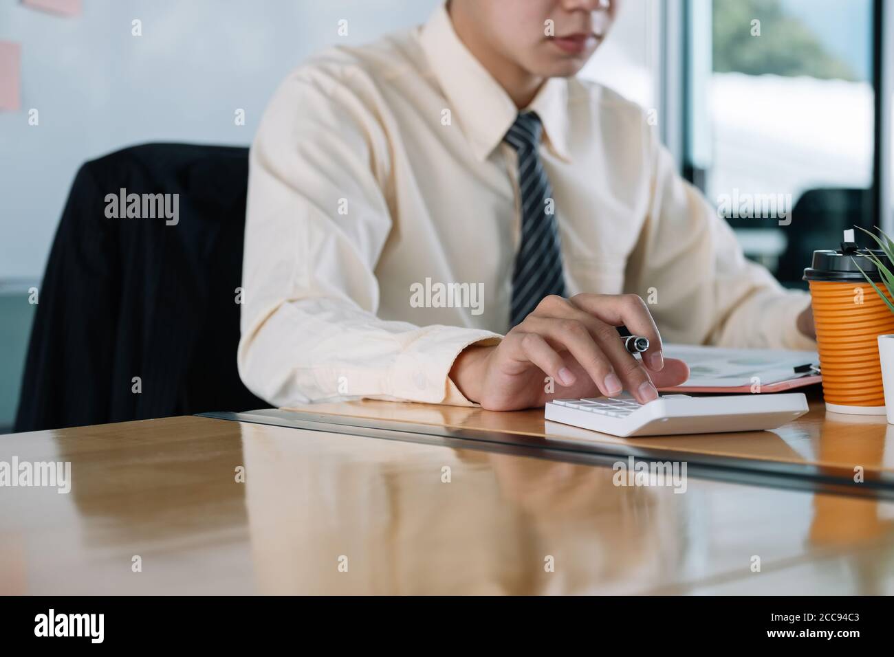 Businessman hand examining invoice hi-res stock photography and images ...