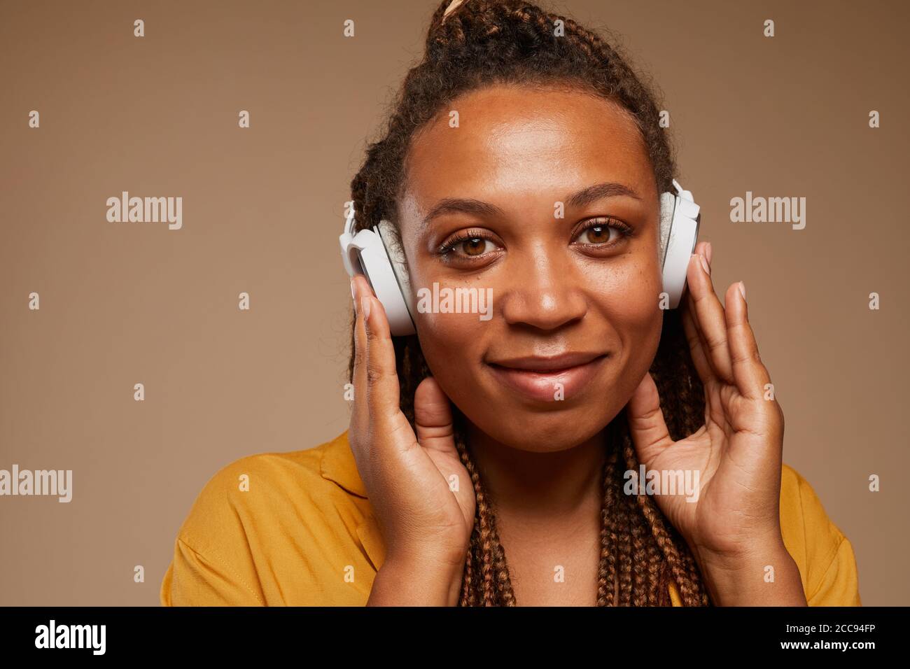 Beautiful adult woman listening hi-res stock photography and images - Alamy