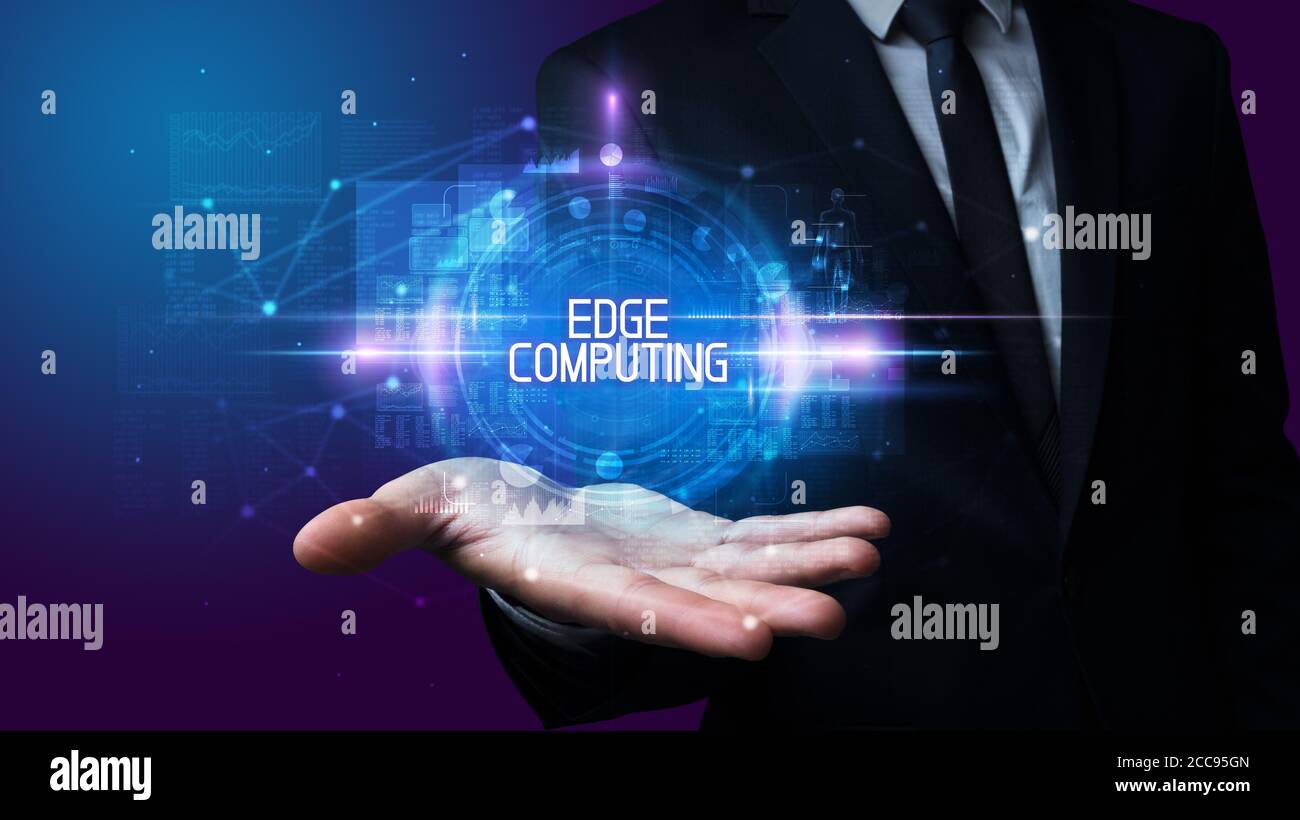 Man hand holding EDGE COMPUTING inscription, technology concept Stock Photo