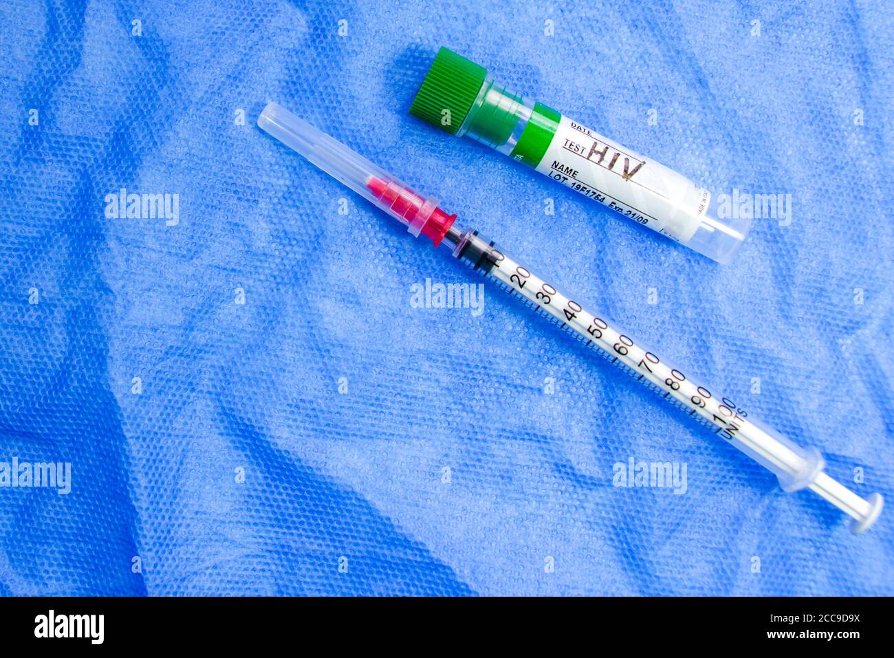 HIV and aids infection test, doctors face and hand holding tube with ...
