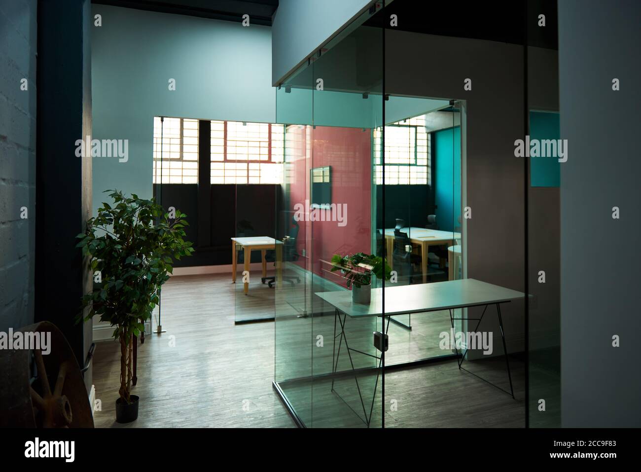 Empty offices in a shared workspace after business hours Stock Photo