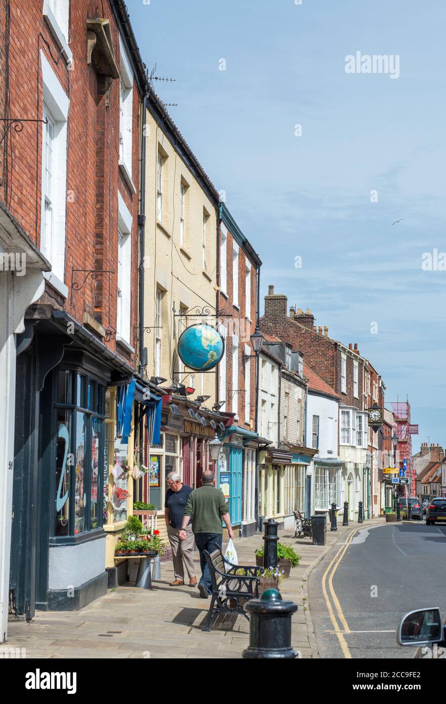 View of shops and a pub along High Street, Old Town, Bridlington, East