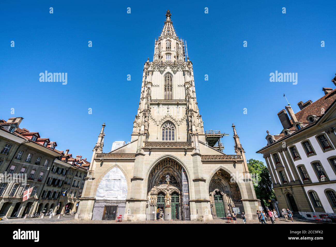 Bern Switzerland , 27 June 2020 : Wide angle facade view of the Bern Minster St. Vincent protestant church building a Swiss Reformed cathedral in Bern Stock Photo