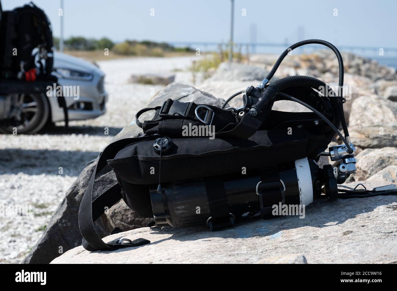 Scuba equipment on a stone. The Island, On in Swedish, is a very popular spot for scuba diving in Malmo Stock Photo