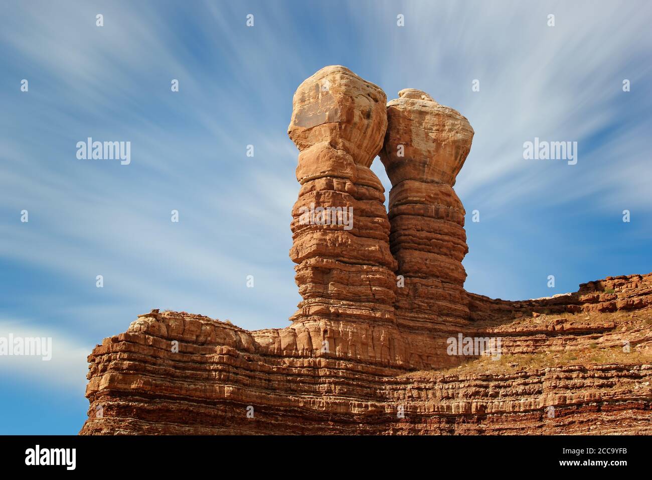 The Navajo Twins, twin rocks geologic formation in the historic pioneer towwn of Bluff, Utah Stock Photo