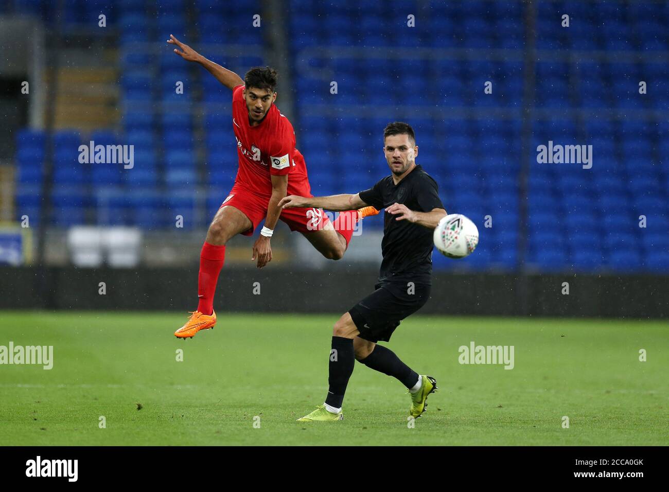Cardiff, UK. 19th Aug, 2020. Sameron Singh-Dool of Connah's Quay Nomads (l) in action. UEFA Champions league first qualifying round match, Connah's Quay Nomads (Wales) v FK Sarajevo (Bosnia) at the Cardiff City Stadium in Cardiff, Wales on Wednesday 19th August 2020. this image may only be used for Editorial purposes. Editorial use only, license required for commercial use. No use in betting, games or a single club/league/player publications. pic by Andrew Orchard/Andrew Orchard sports photography/Alamy Live news Credit: Andrew Orchard sports photography/Alamy Live News Stock Photo