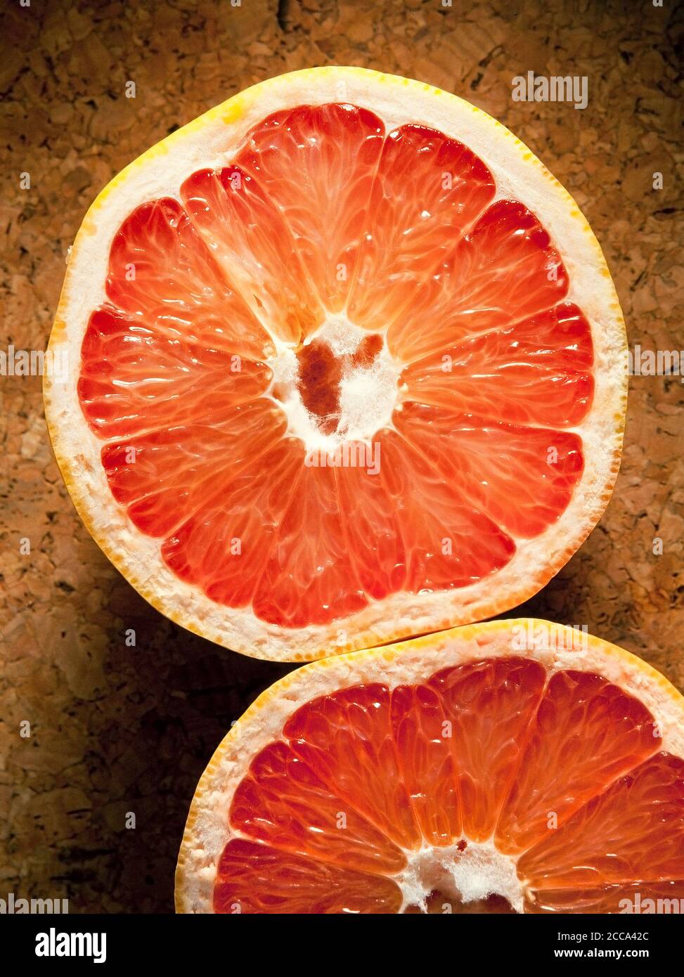 Pink Grapefruit, Citrus paradisi, cut section. Stock Photo