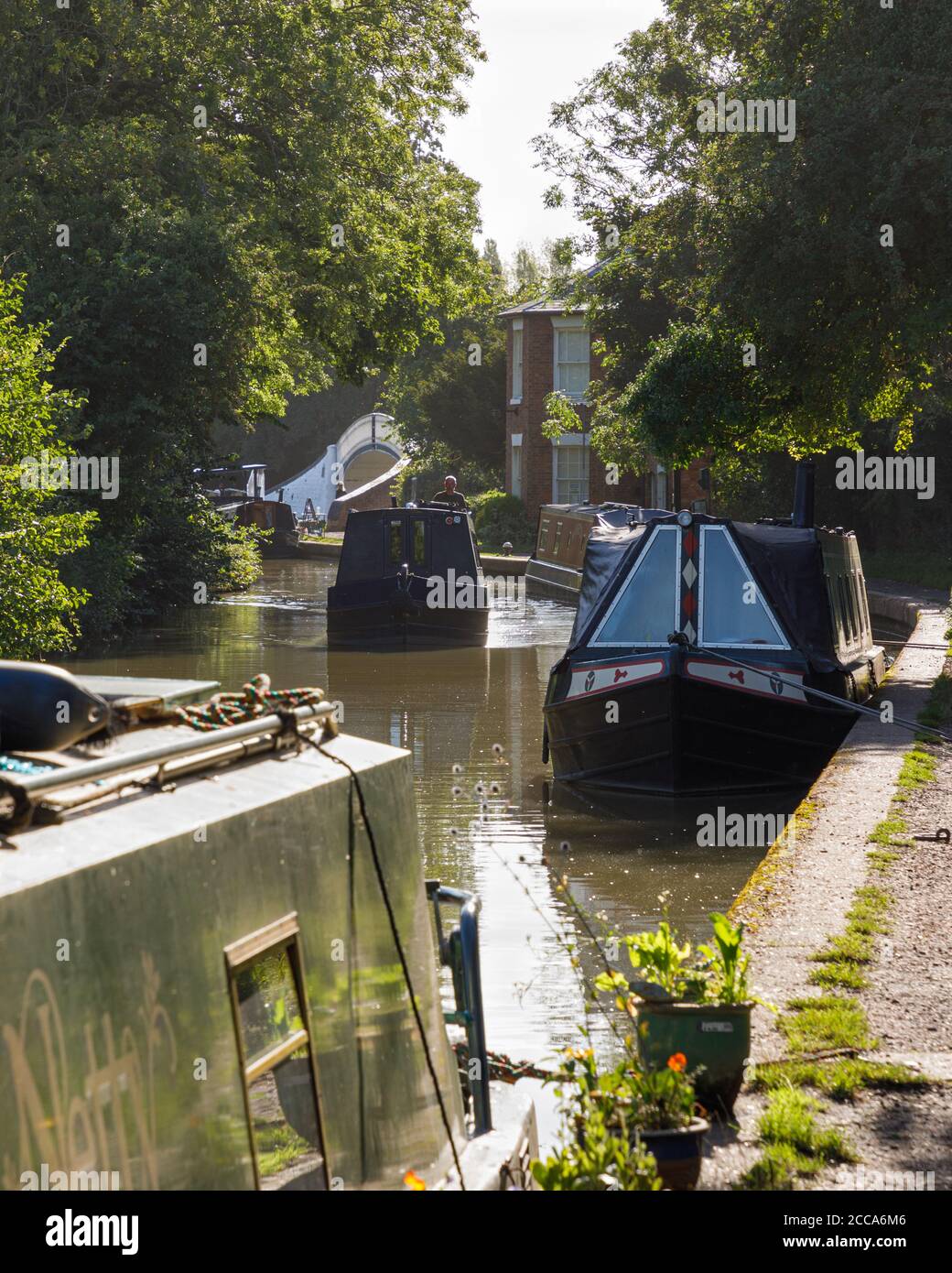 Braunston, Northamptonshire, UK - 20/08/20: Narrowboats moored on the Grand Union canal at Braunston, one of the busiest places on the UK waterways. Stock Photo