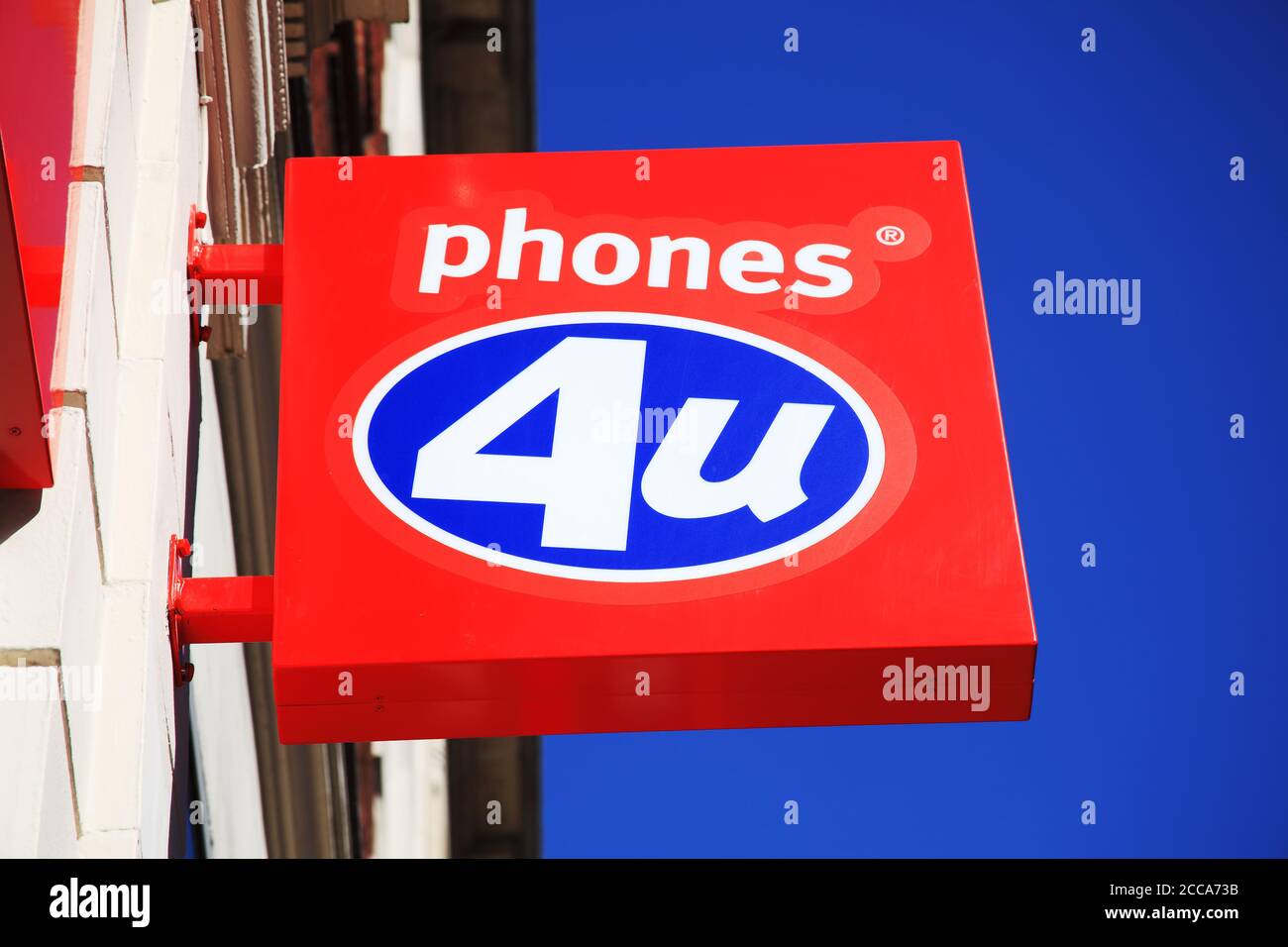 London, UK, Apr 1, 2012 : Phones 4U logo advertising sign at its branch retail business outlet in Oxford Street stock photo Stock Photo