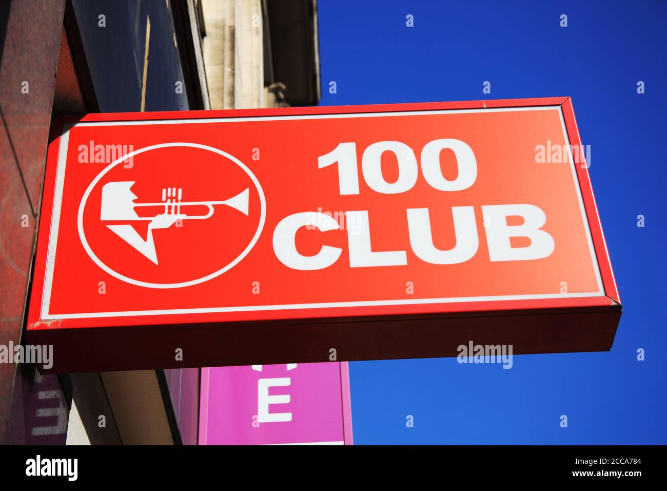 London, UK, April 1, 2012 : The 100 Club jazz and rock music venue logo advertising sign in Oxford Street which is a popular travel destination touris Stock Photo
