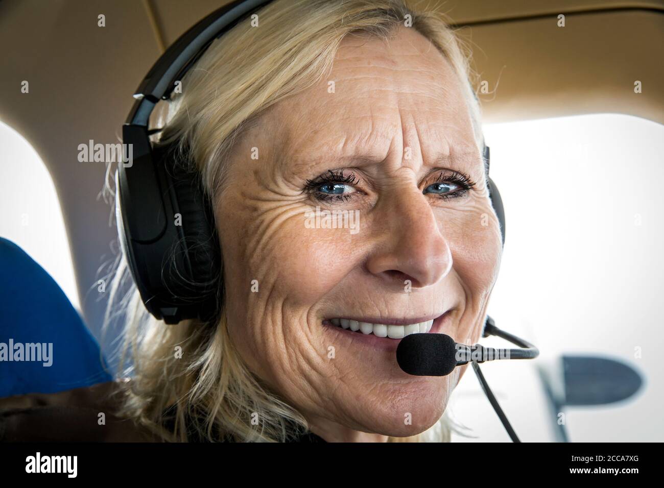 Ferry pilot Margrit Budert Walz in the cockpit of the Socata TBM 900