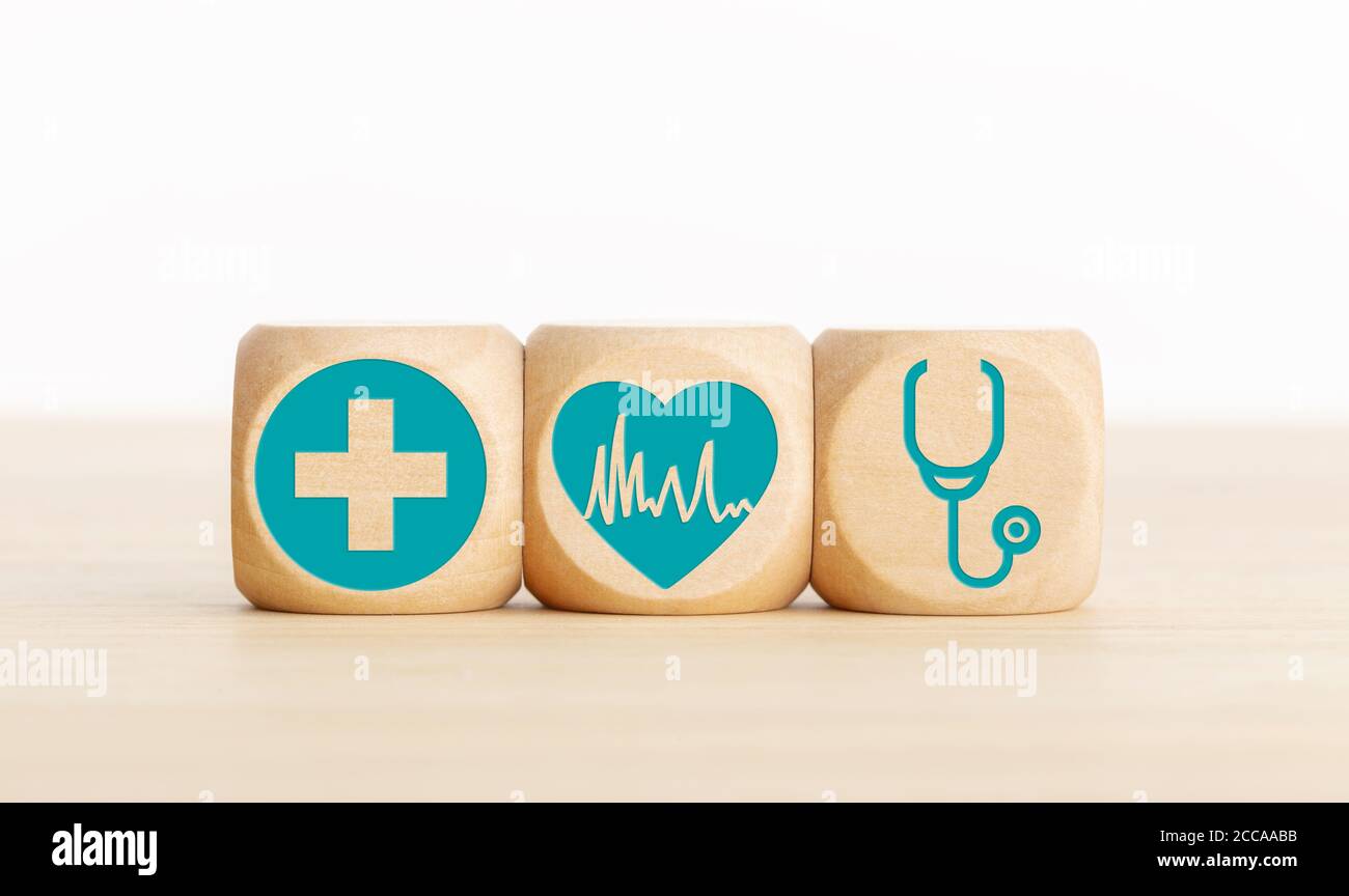 Cardiology concept. Wooden blocks with medical icon on table. Copy space Stock Photo