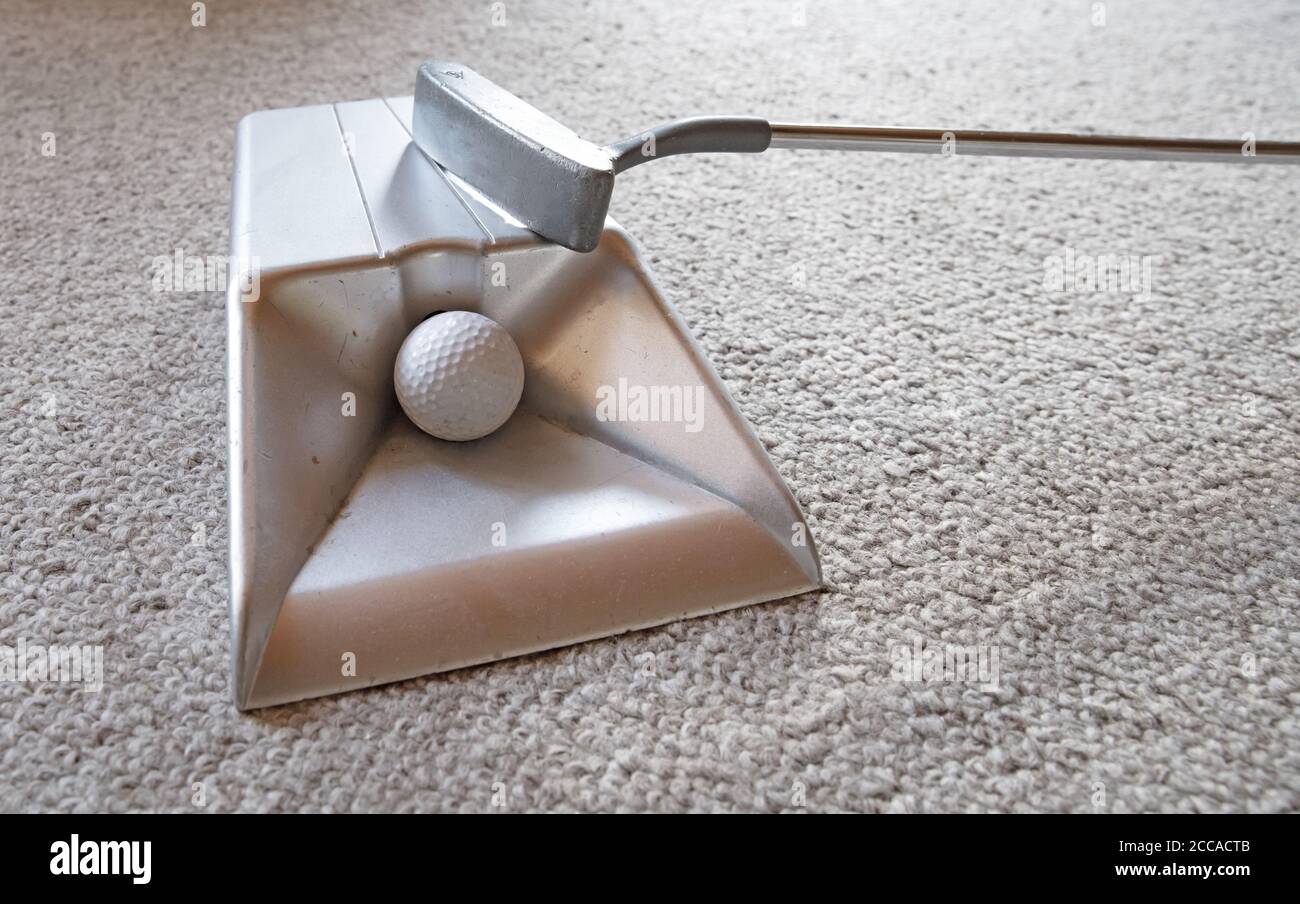 Indoor mini golf, killing time with a little game Stock Photo