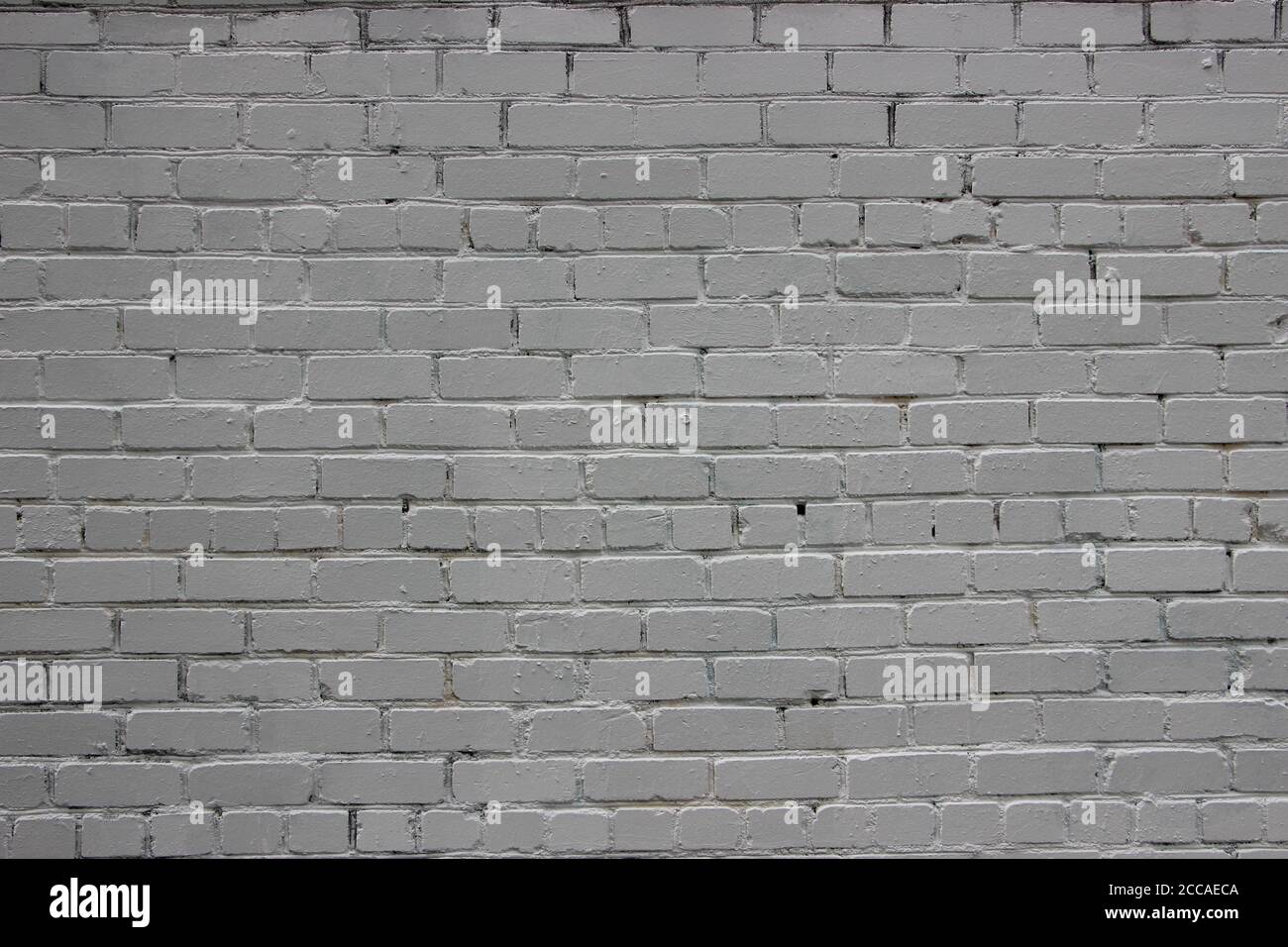 Light grey grunge brick wall background texture Stock Photo - Alamy