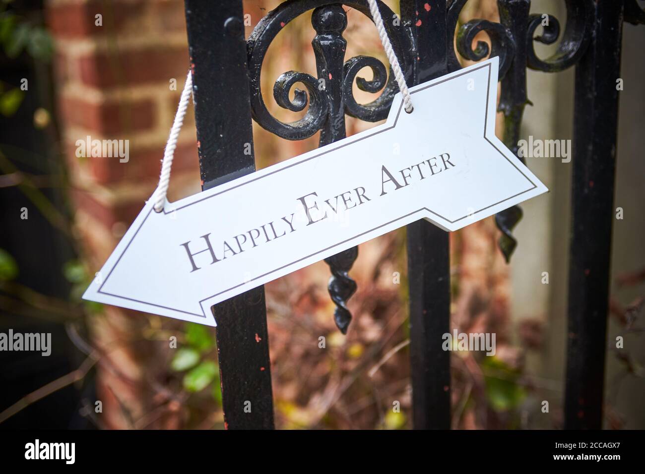 Sign for a wedding reception reading Happily Ever After Stock Photo