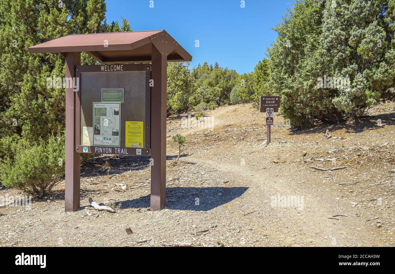 GARDNERVILLE, NEVADA, UNITED STATES - Aug 13, 2020: A sign post at the Pinyon Trailhead, a hiking, mountain biking and equestrian path outside of Gard Stock Photo