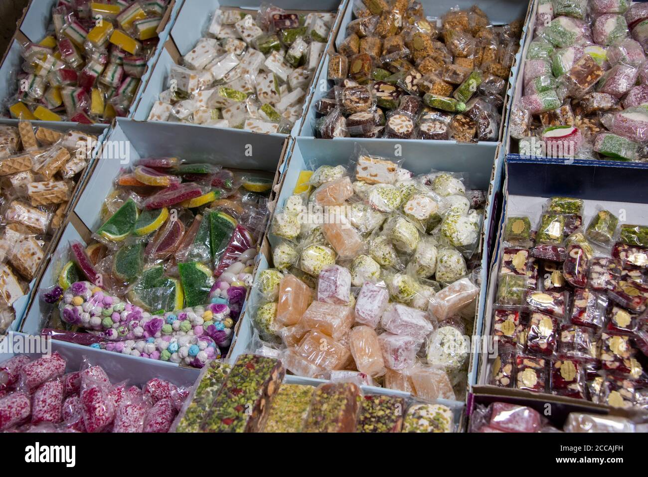 Israel, Jerusalem, Old City, Via Dolorosa. Typical candy vendor stand