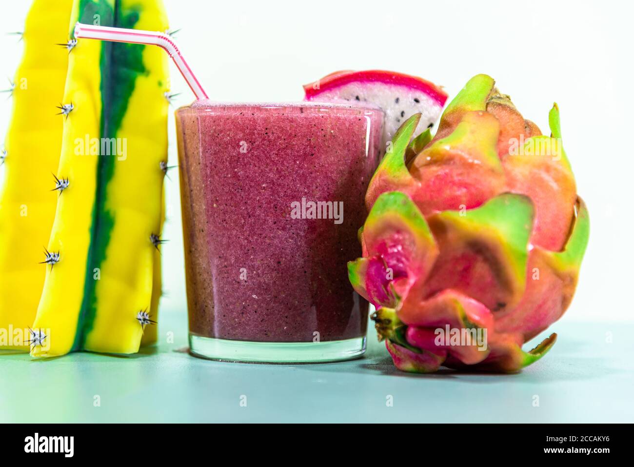 Pitaya juice (Hylocereus polyrhizus). Pink and flaky fruit. Energy and exotic drink. Dragon fruit. Low-calorie detoz juice. white pitaia (pink on the Stock Photo
