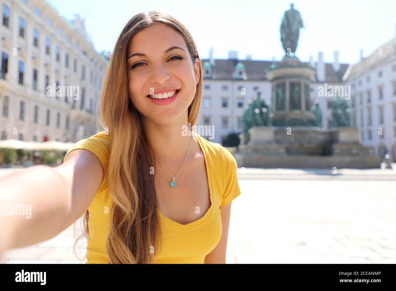 Happy smiling woman in Vienna on summer. Traveler girl take self ...