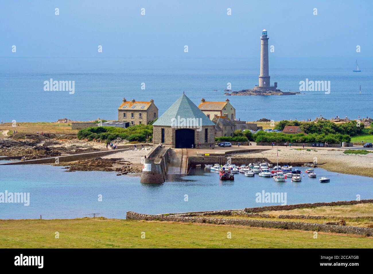 Phare de Goury lighthouse and lifeboat station in the port near