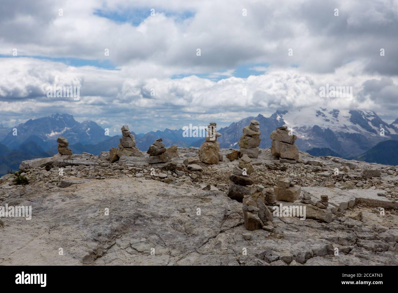 Cairns are principally used as points of reference, particularly in the mountains; they are built by hikers to mark the route in the absence of signs Stock Photo