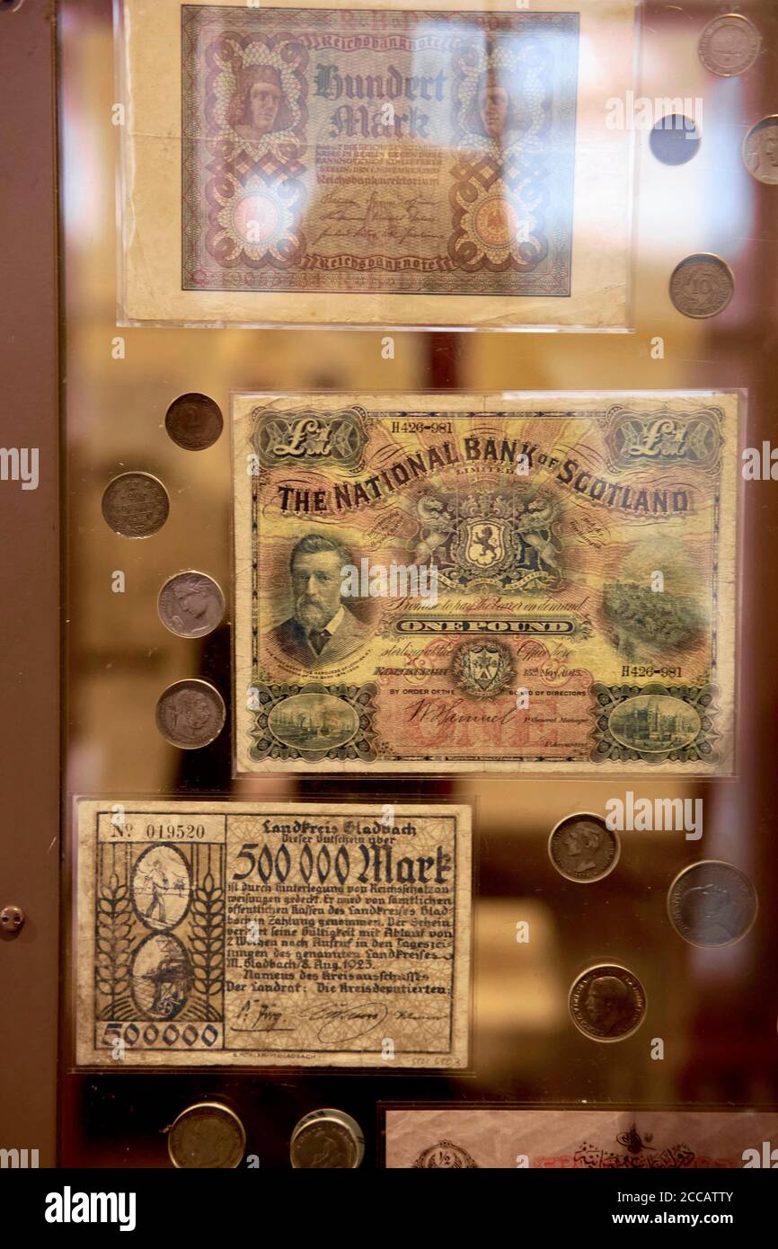Antique Scottish Pound and Mark notes on display at the Ellis Island Museum. Stock Photo