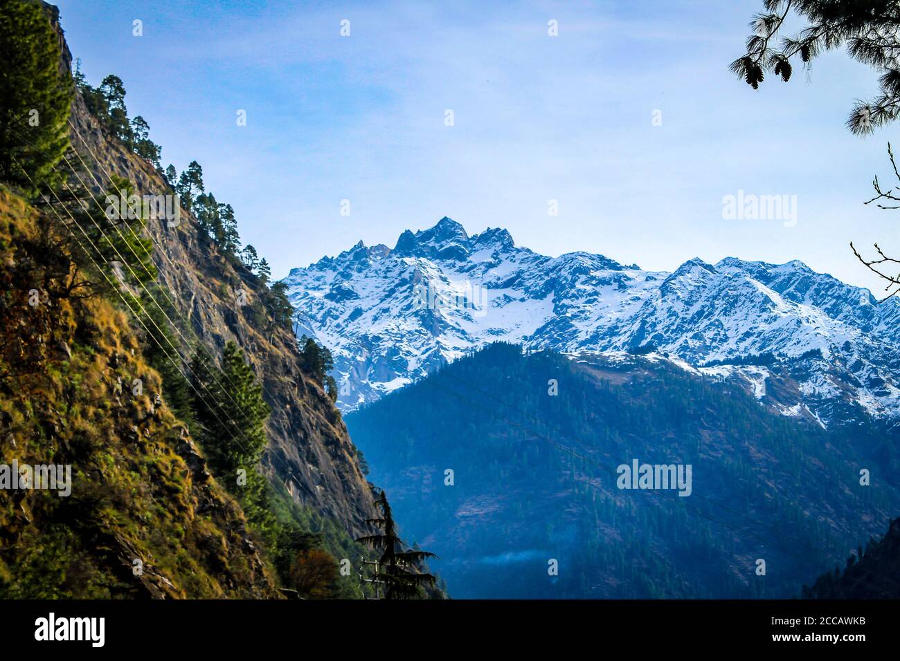 Kasol Manali - Gushing Parvati river in the snow mountains of Himachal Pradesh, India. River water rushing  in the valley of gods. Himachal Pradesh. Stock Photo