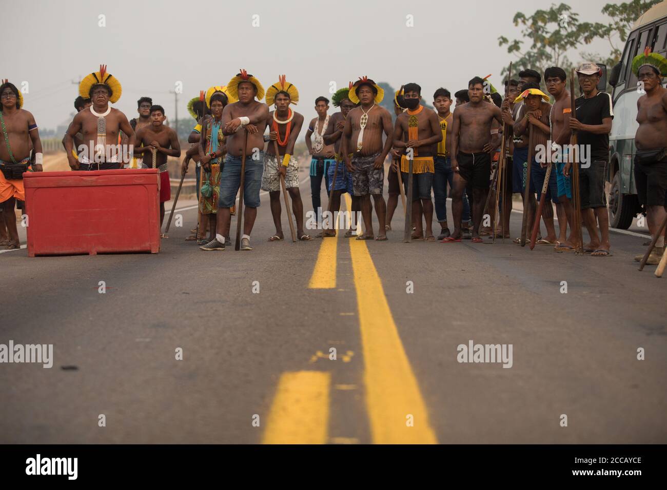 Novo Progresso, Para, Brazil. 18th Aug, 2020. Kayapo Indigenous keep the road blocked shortly after receiving a court order determining the unblocking of the BR 163 highway in 24 hours, in the municipality of Novo Progresso, in the state of Para on the late afternoon of Tuesday. The indigenous people blocked the highway in protest of the lack of health resources to face Covid-19, against the lack of dialogue by the federal government in the concession processes for the private initiative of the BR-163 highway and for the end of illegal mining and deforestation. (Credit Image: © Fernando Souza Stock Photo