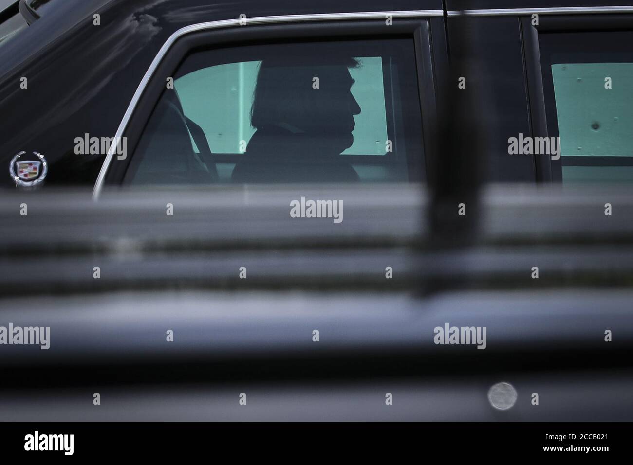 Washington, United States. 20th Aug, 2020. President Donald Trump rides the Presidential limousine known as 'the beast' that uses specially-made Goodyear tires, at Joint Base Andrews, Maryland on Thursday, August 20, 2020. President Trump on Wednesday urged consumers to snub Goodyear tires after the company banned employees from wearing political attire, including pro-Trump hats. Goodyear is one of two American-owed tire manufacturers. Photo by Oliver Contreras/UPI Credit: UPI/Alamy Live News Stock Photo